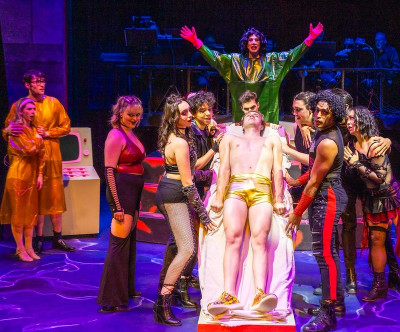 From left to right Janet (Janet Kassal), Brad (Michael Lynch), Frank-n-Furter (John McNally), Rocky (Ben Chalex) and Phantoms in The Rocky Horror Show Live at Brightside Theatre.