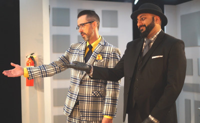 Subhash Thakrar is Kubs(right) and Joel Moses is Balas in Organic Theater's production of The Memo at Greenhouse Theatre.