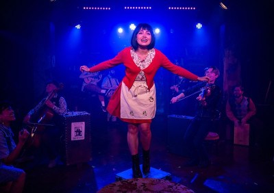 Pictured (center) Aurora Penepacker with the cast of Kokandy Productions' Chicago premiere of Amélie.