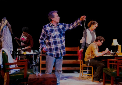 Danielle Louise Reddick (left), John Flax, Elisabeth Glass and Apollo Garcia in "Action at a Distance. . .in 2025" from Fay|Glassman Performance crafted in collaboration with Grottesco Theater. It runs through November 16 at Facility Theater in Chicago.