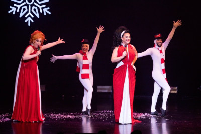 (left to right forefront) Jinkx Monsoon and BenDeLaCreme along with ensemble members in The Jinkx &amp; DeLa Holiday Show.