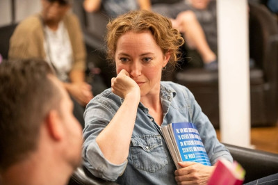 Rebecca Spence up close with an audience-actor, in Every Briliant Thing.
