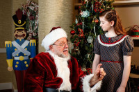 Neil Friedman as Kris Kringle and Stella Rose Hoyt as Susan in Theater at the Center's "Miracle on 34th Street the Musical"