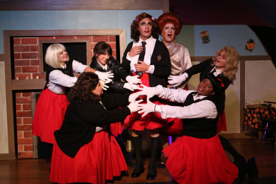 (left to right) Katy Campbell, Brenna L. Watkins, Alexa Castelvecchi, David Cerda, Ed Jones, Robert Williams and Graham Heacock in Hell in a Handbag Productions’ world premiere musical parody 'The Facts of Life - Satan’s School for Girls.